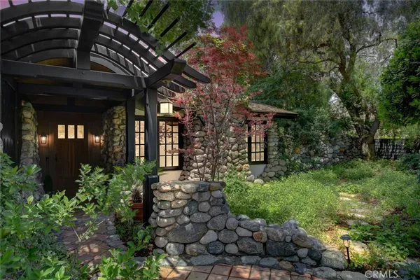 a backyard of a house with lots of green space