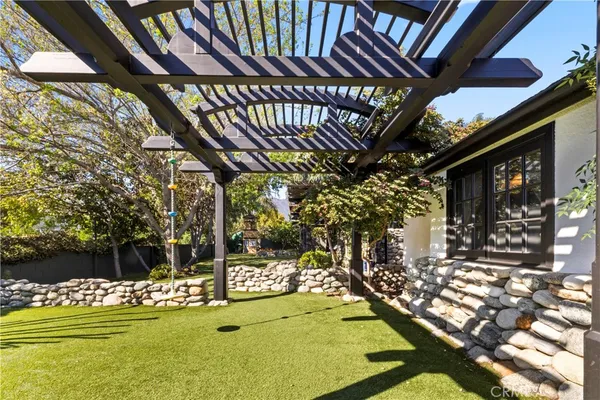 a view of swimming pool with a patio