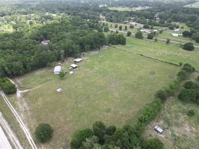 a view of a lake with a yard