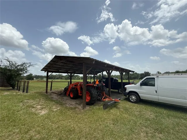 a view of a backyard of a house