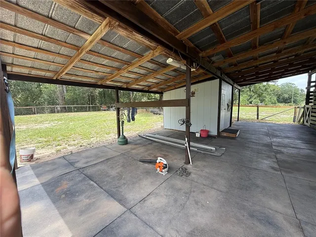 a view of an empty room with a garage