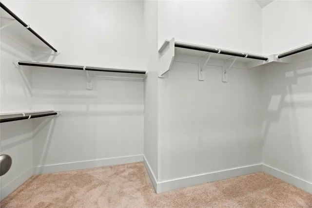 a bathroom with a double vanity sink and mirror