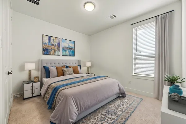 a bathroom with a bathtub and a sink