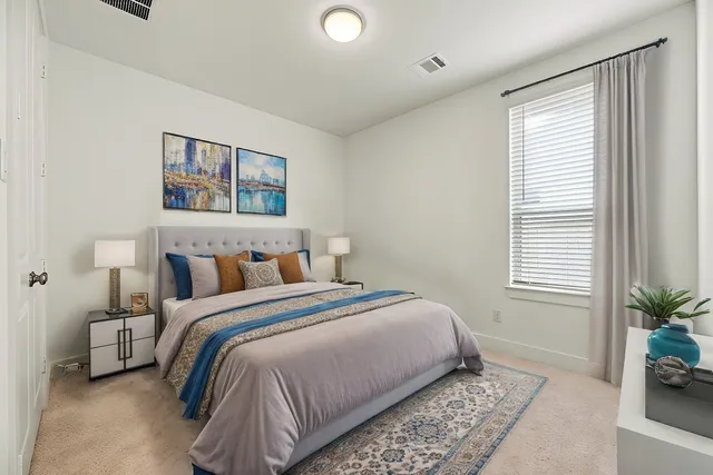 a bathroom with a bathtub and a sink
