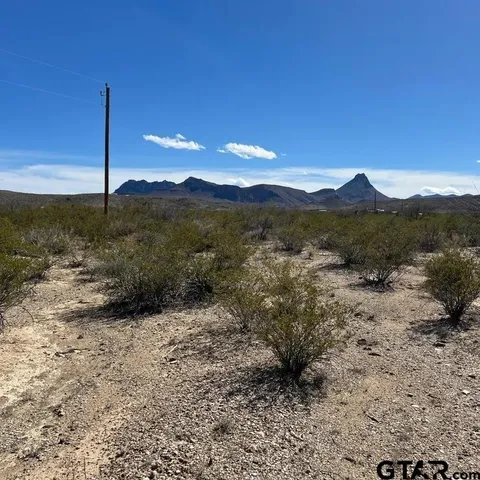 a view of mountain view with mountains in the background