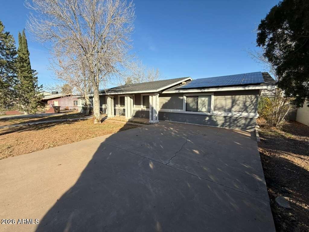 3110 East 13th Street Douglas, AZ 85607 - Photo 2 of 42 a front view of a house with a yard