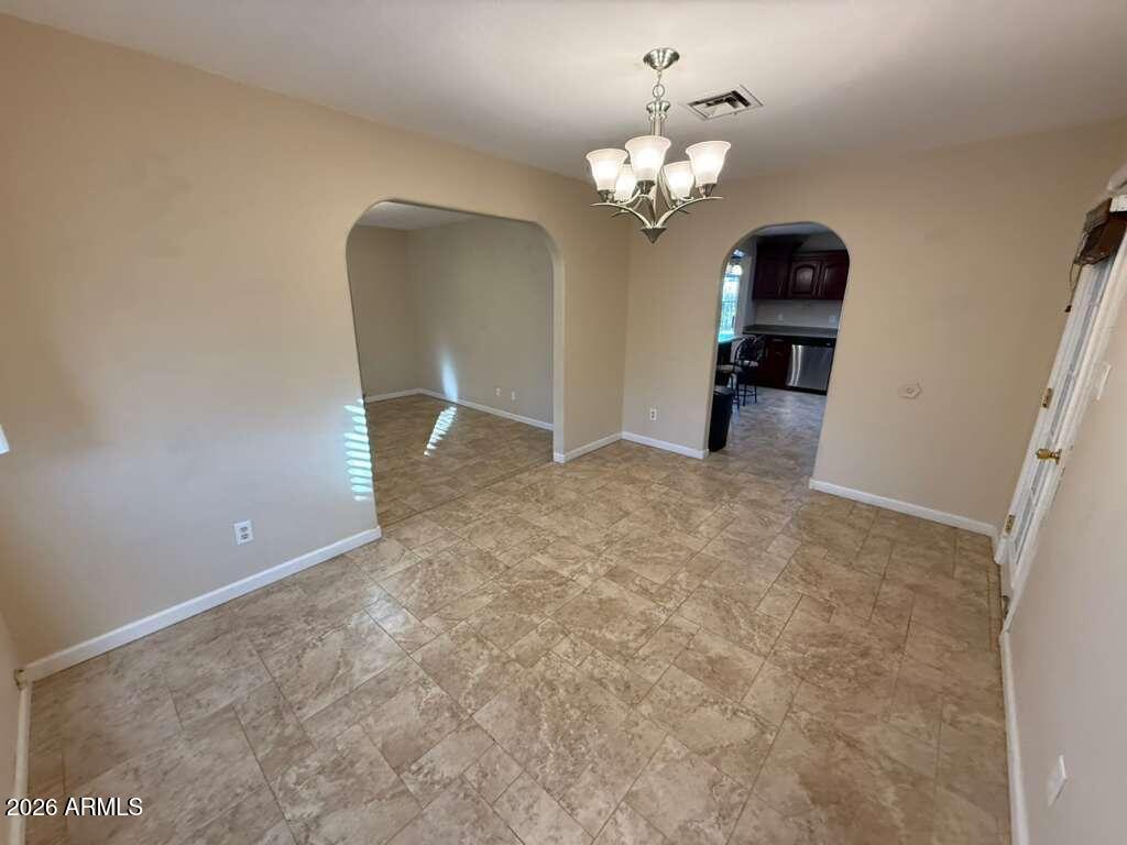 3110 East 13th Street Douglas, AZ 85607 - Photo 33 of 42 a view of a chandelier in big room with a chandelier