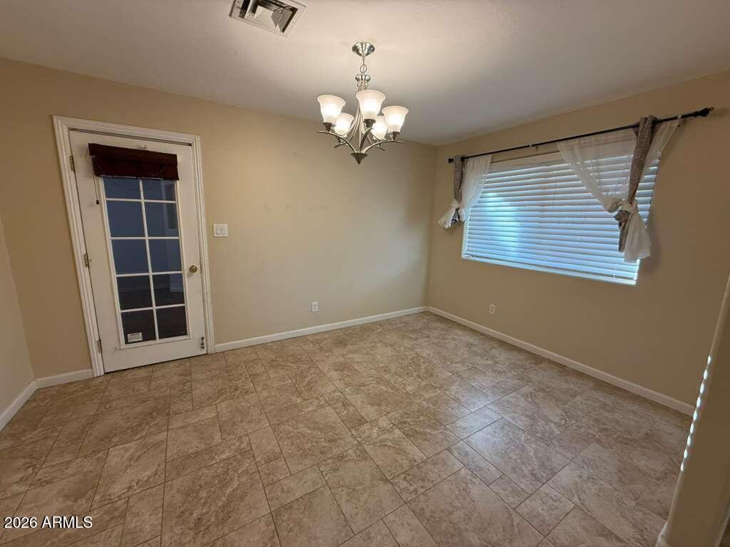 3110 East 13th Street Douglas, AZ 85607 - Photo 36 of 42 a view of an empty room with a window