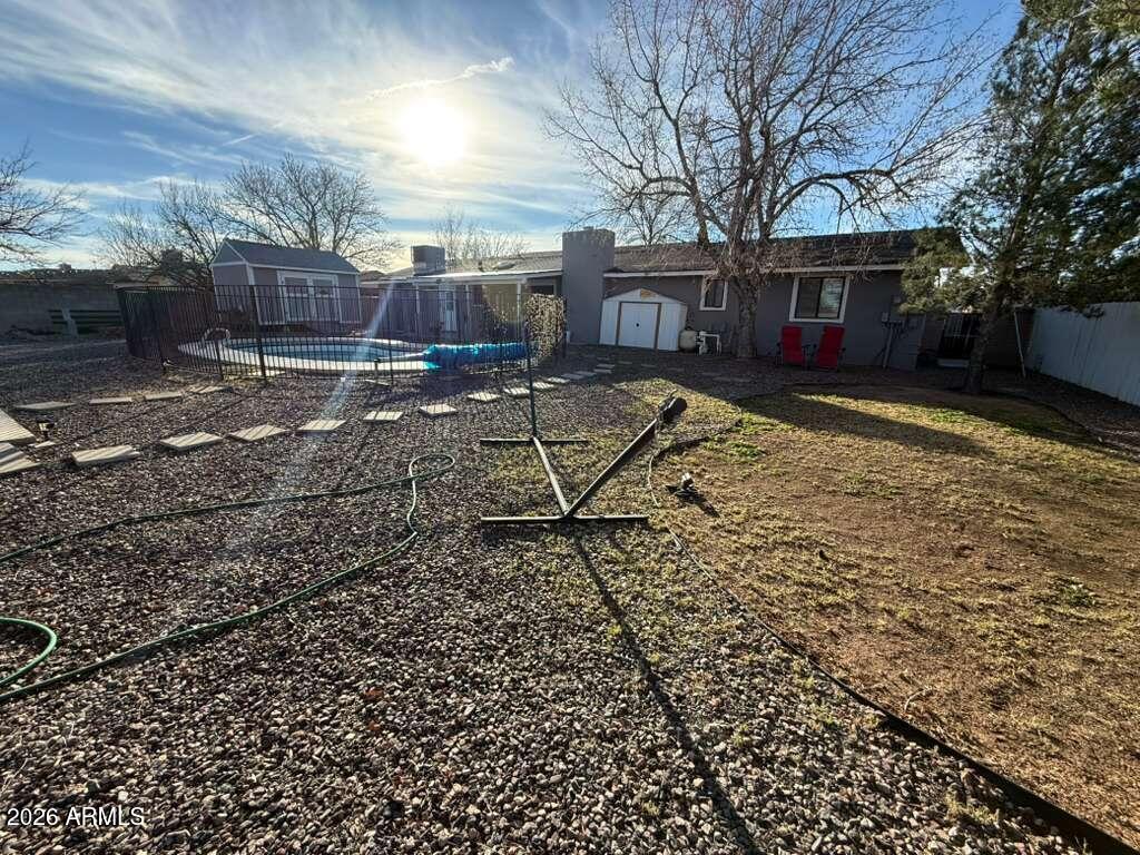 3110 East 13th Street Douglas, AZ 85607 - Photo 6 of 42 a view of a yard with a house and a yard