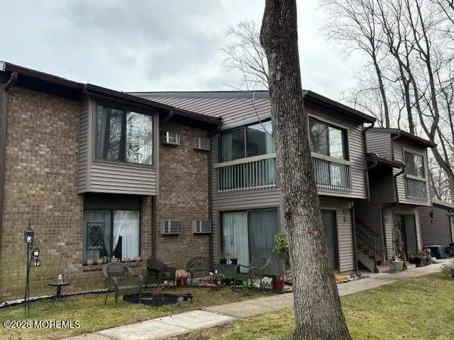 a front view of a house with garage