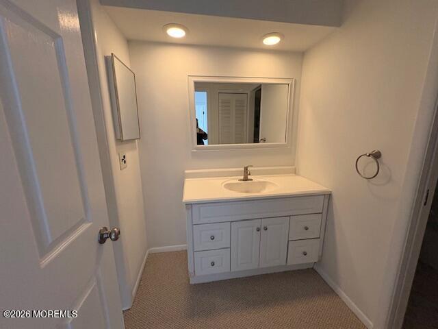 15 Lexington Court Red Bank, NJ 07701 - Photo 11 of 21 a bathroom with a sink and a mirror