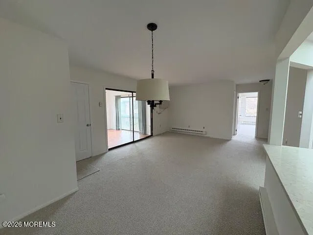 a view of empty room with windows