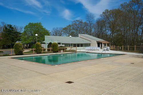 15 Lexington Court Red Bank, NJ 07701 - Photo 24 of 27 a view of house with swimming pool and yard