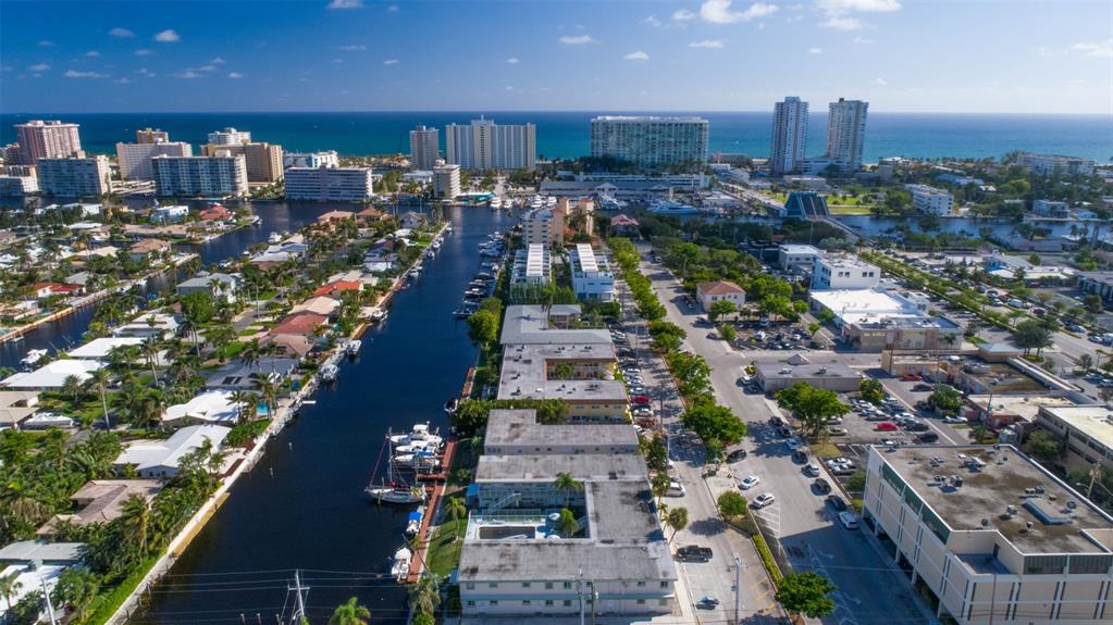 2621 Northeast 1st Street, Unit 10 Pompano Beach, FL 33062 - Photo 8 of 9 a city view with tall buildings