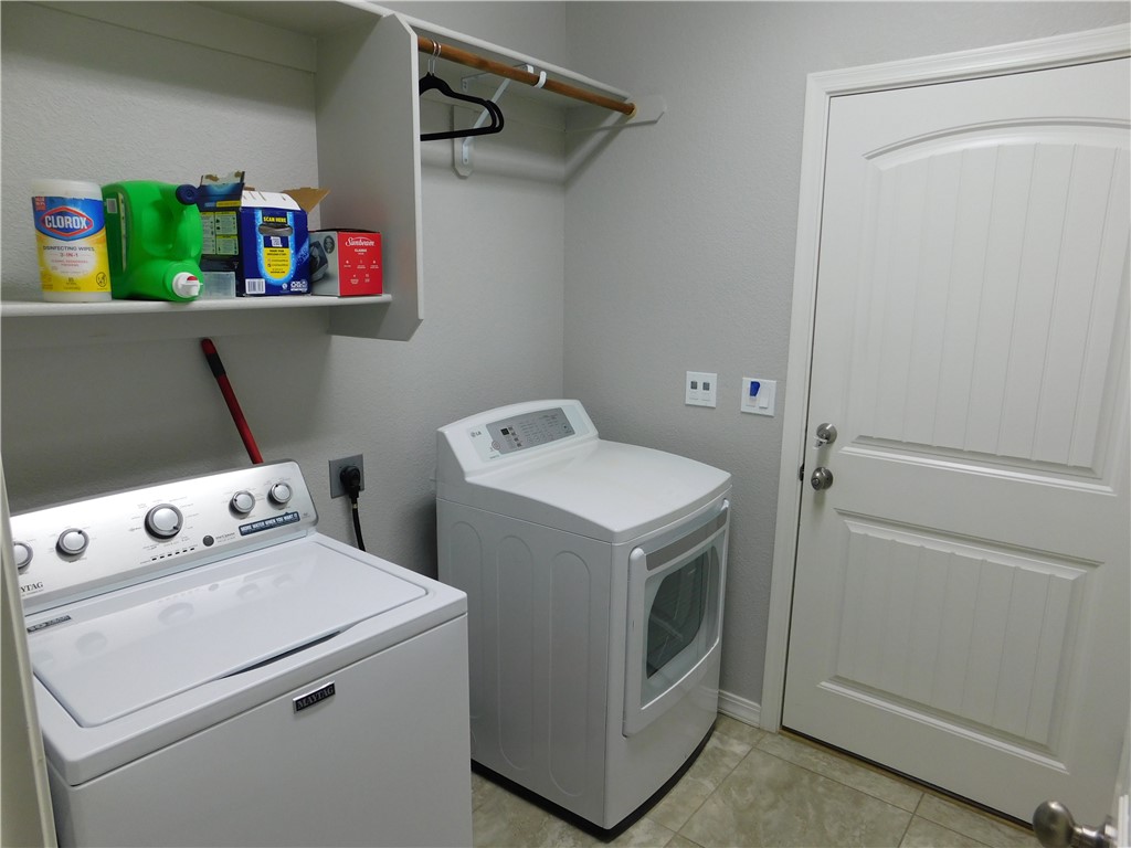 3370 South Ridge Avenue Bullhead City, AZ 86429 - Photo 52 of 56 a utility room with dryer and washer