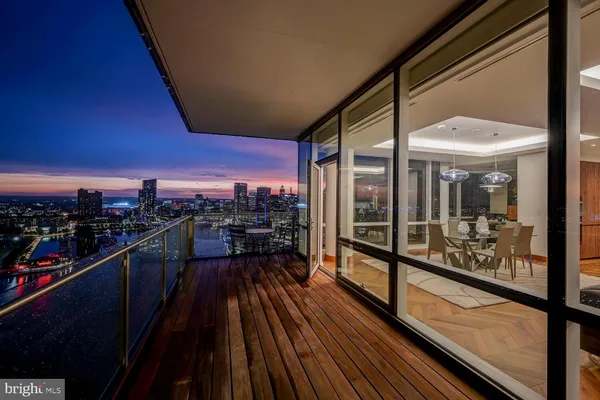 a view of a balcony with chairs