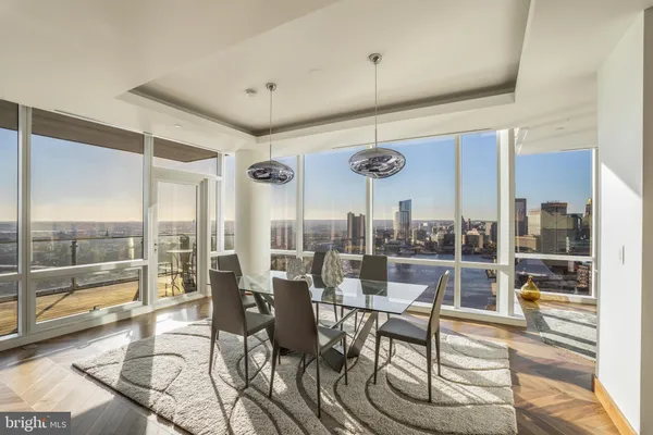a view of a dining room with furniture window and outside view