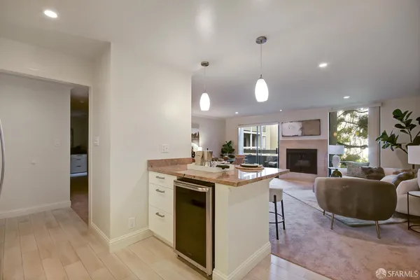 a view of a hallway with a room