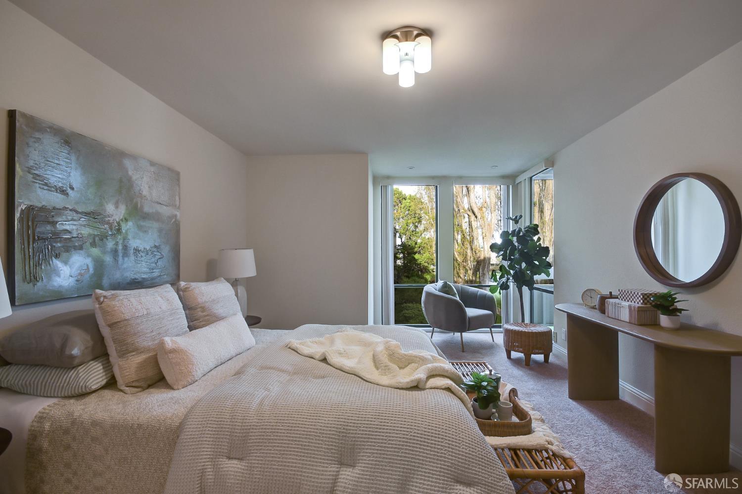 1171 Compass Lane, Unit 209 Foster City, CA 94404 - Photo 22 of 55 a bedroom with a bed a mirror on dresser and a large window