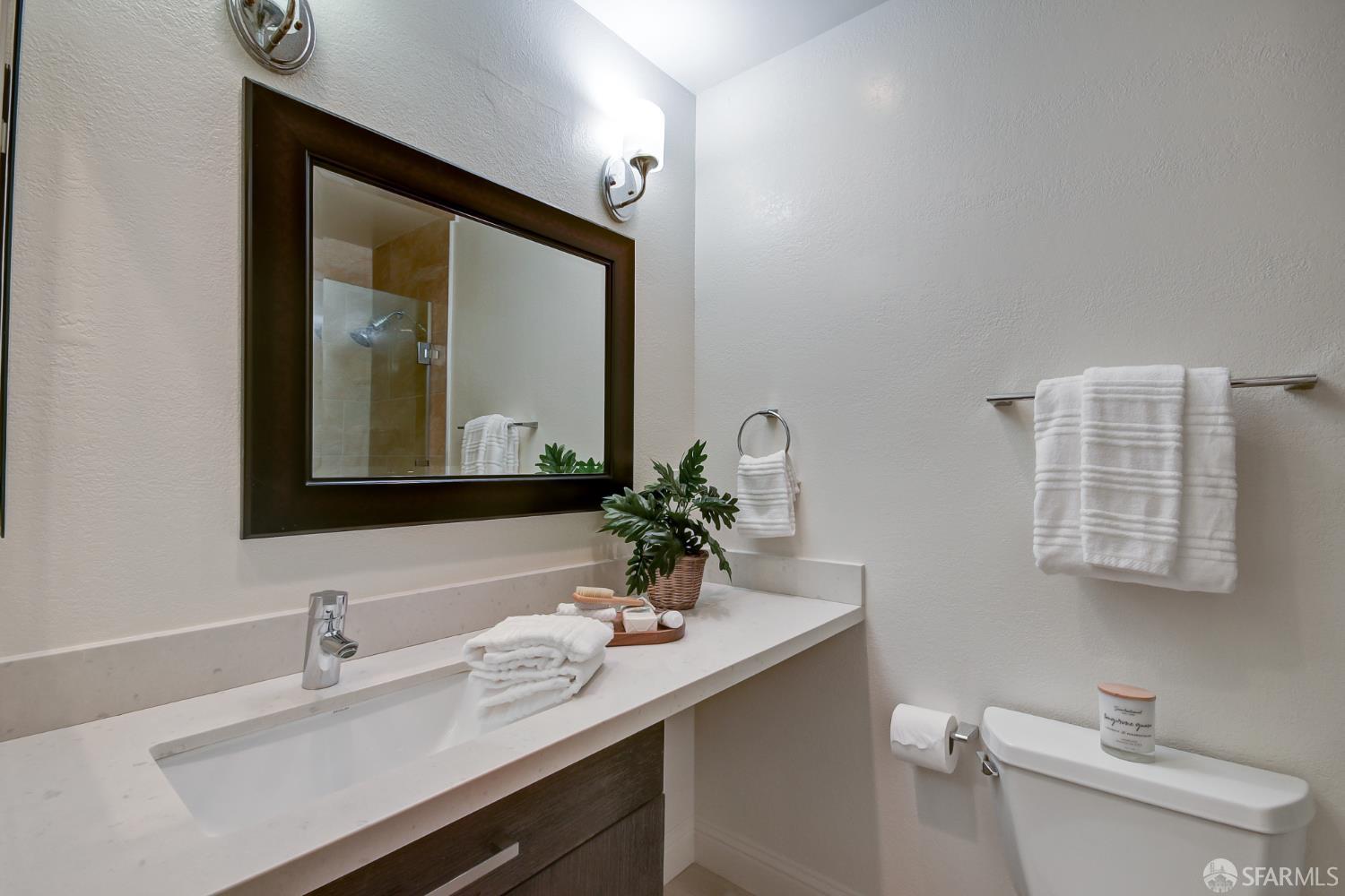 1171 Compass Lane, Unit 209 Foster City, CA 94404 - Photo 32 of 55 a bathroom with a sink and a mirror