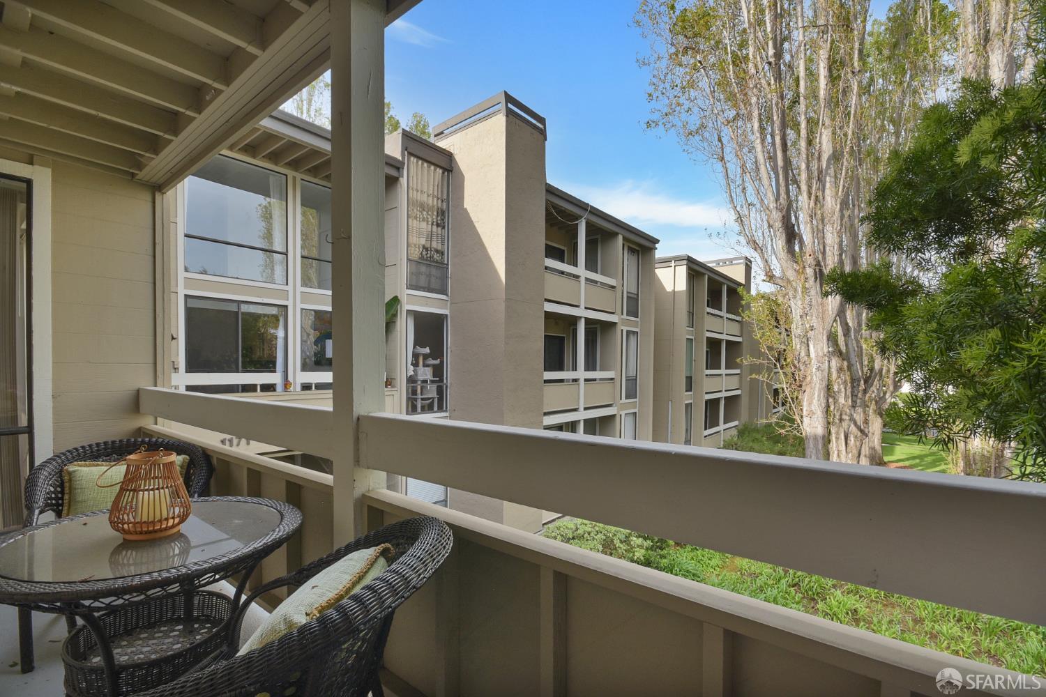 1171 Compass Lane, Unit 209 Foster City, CA 94404 - Photo 38 of 55 a front view of a house with outdoor seating