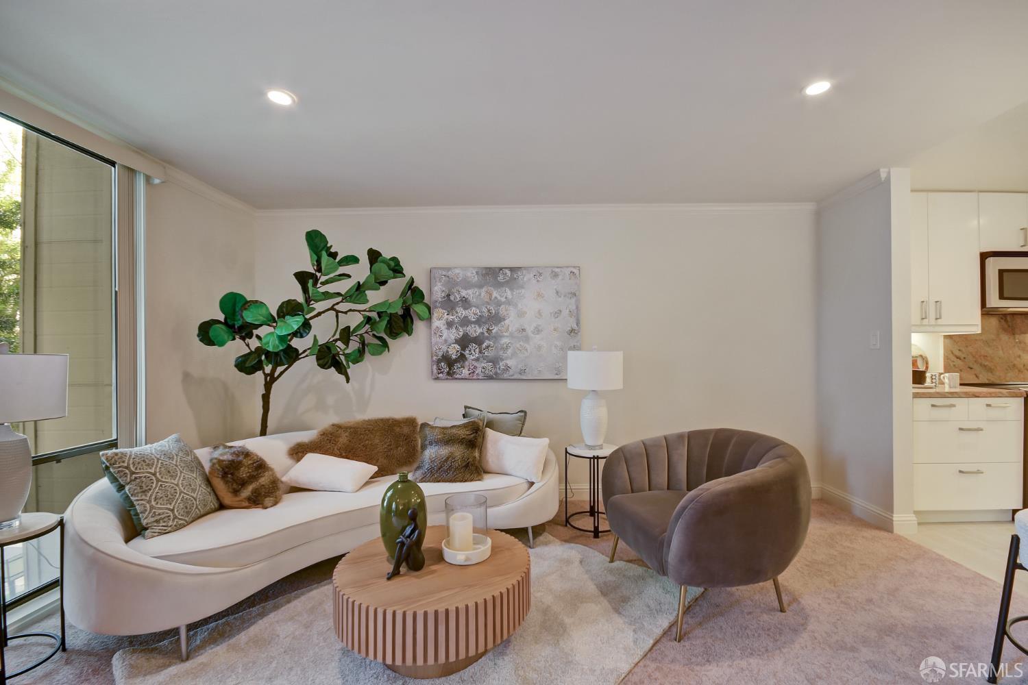 1171 Compass Lane, Unit 209 Foster City, CA 94404 - Photo 4 of 55 a living room with furniture and a potted plant