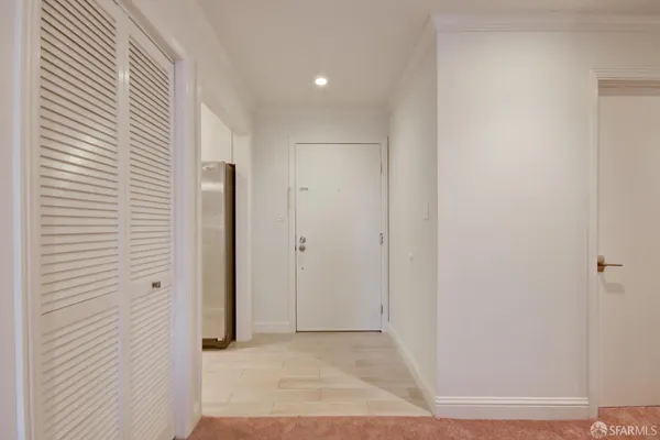 a view of a park with swings and slides