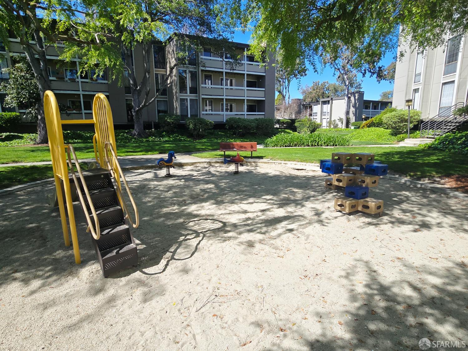 1171 Compass Lane, Unit 209 Foster City, CA 94404 - Photo 49 of 55 a view of a park with a bench and a slide