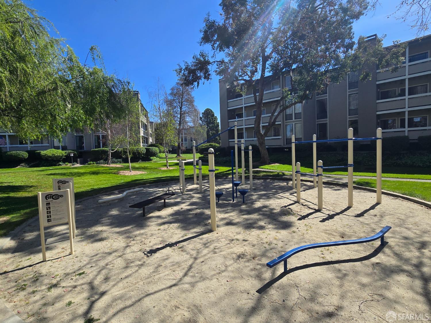 1171 Compass Lane, Unit 209 Foster City, CA 94404 - Photo 50 of 55 a view of a park with swings and slides