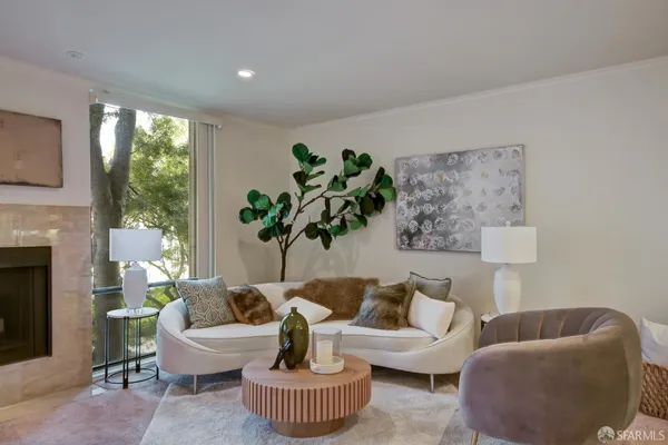 a dining room with furniture and window