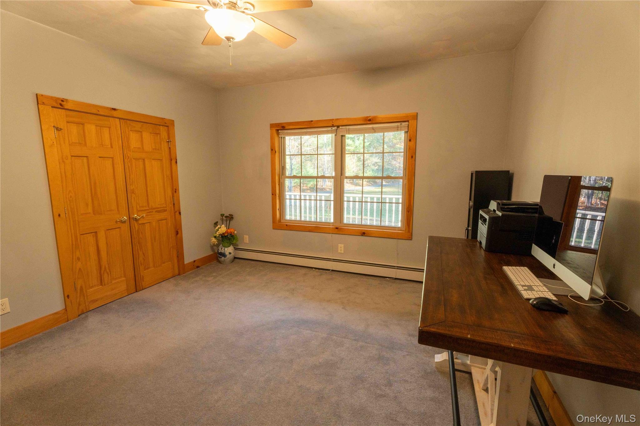 109 3rd Street Godeffroy, NY 12729 - Photo 12 of 16 a view of a workspace with furniture and a window