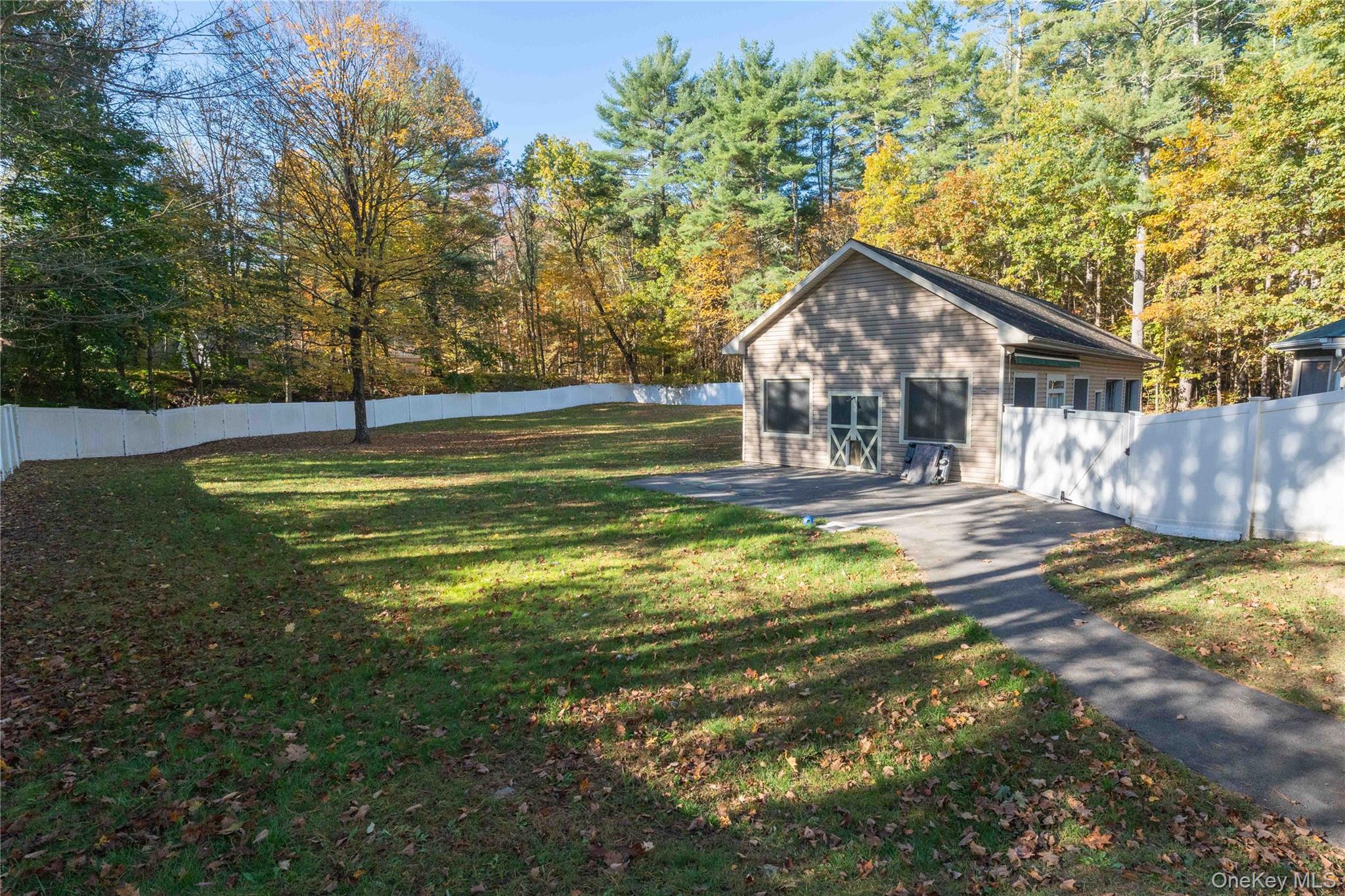 109 3rd Street Godeffroy, NY 12729 - Photo 5 of 16 a swimming pool with outdoor seating and yard