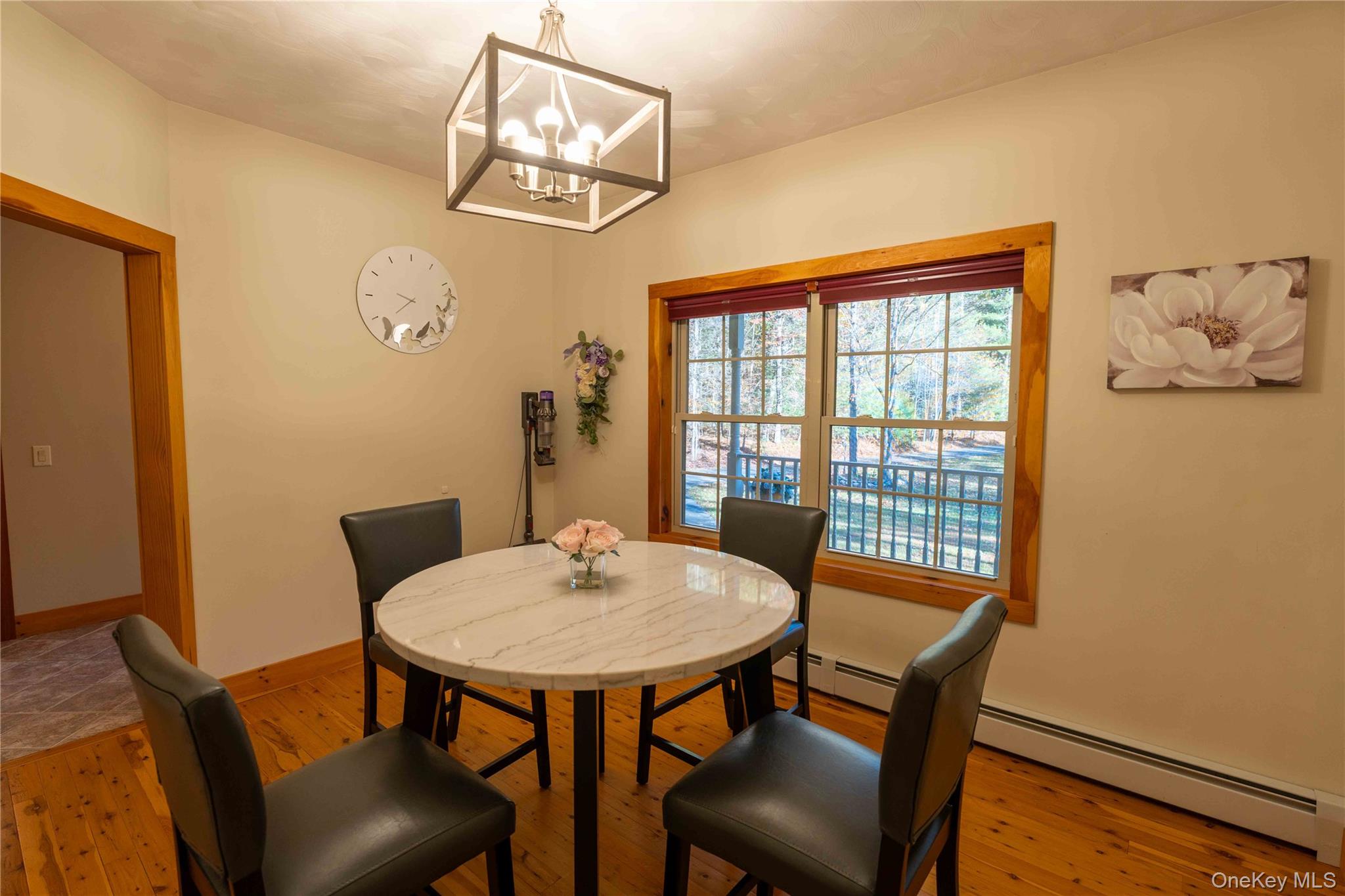 109 3rd Street Godeffroy, NY 12729 - Photo 7 of 16 a view of a dining room with furniture window and wooden floor