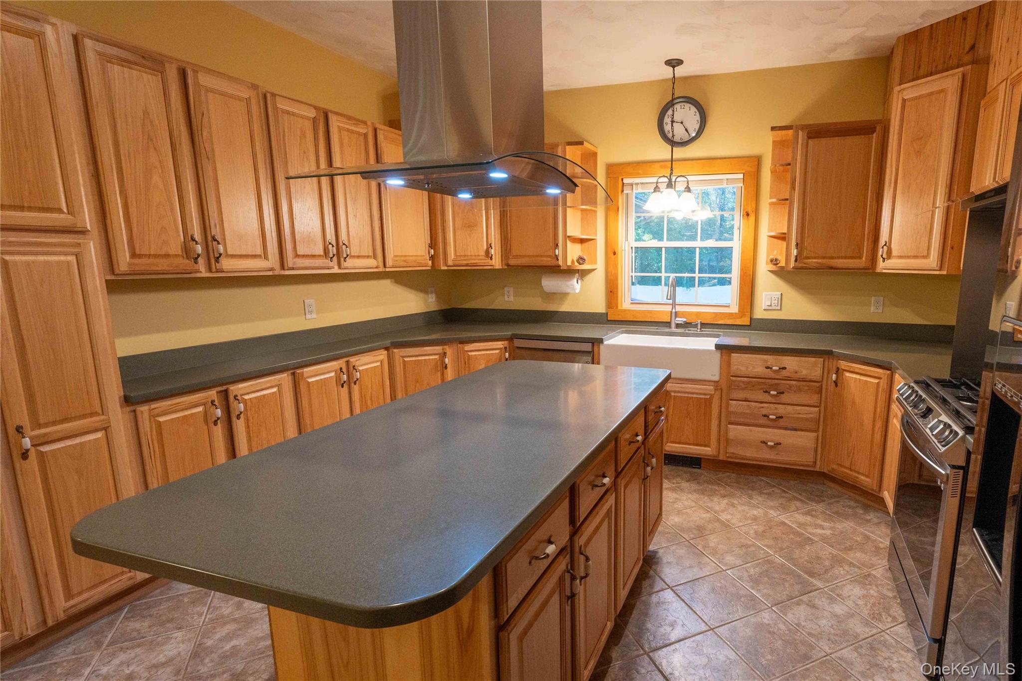 109 3rd Street Godeffroy, NY 12729 - Photo 8 of 16 a kitchen with stainless steel appliances granite countertop a sink a stove and cabinets