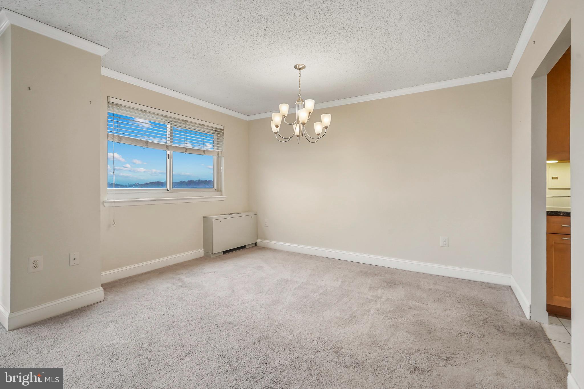 1225 Martha Custis Drive, Unit 1119 Alexandria, VA 22302 - Photo 12 of 36 a view of an empty room with a window