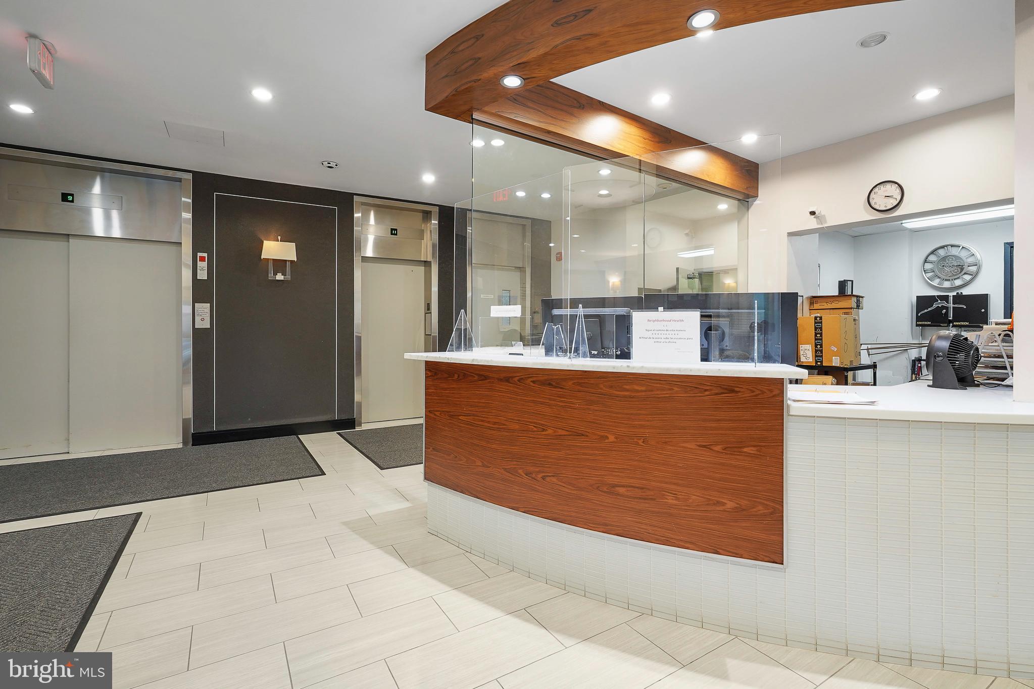 1225 Martha Custis Drive, Unit 1119 Alexandria, VA 22302 - Photo 21 of 36 a view of kitchen with kitchen island stainless steel appliances refrigerator stove microwave and cabinets