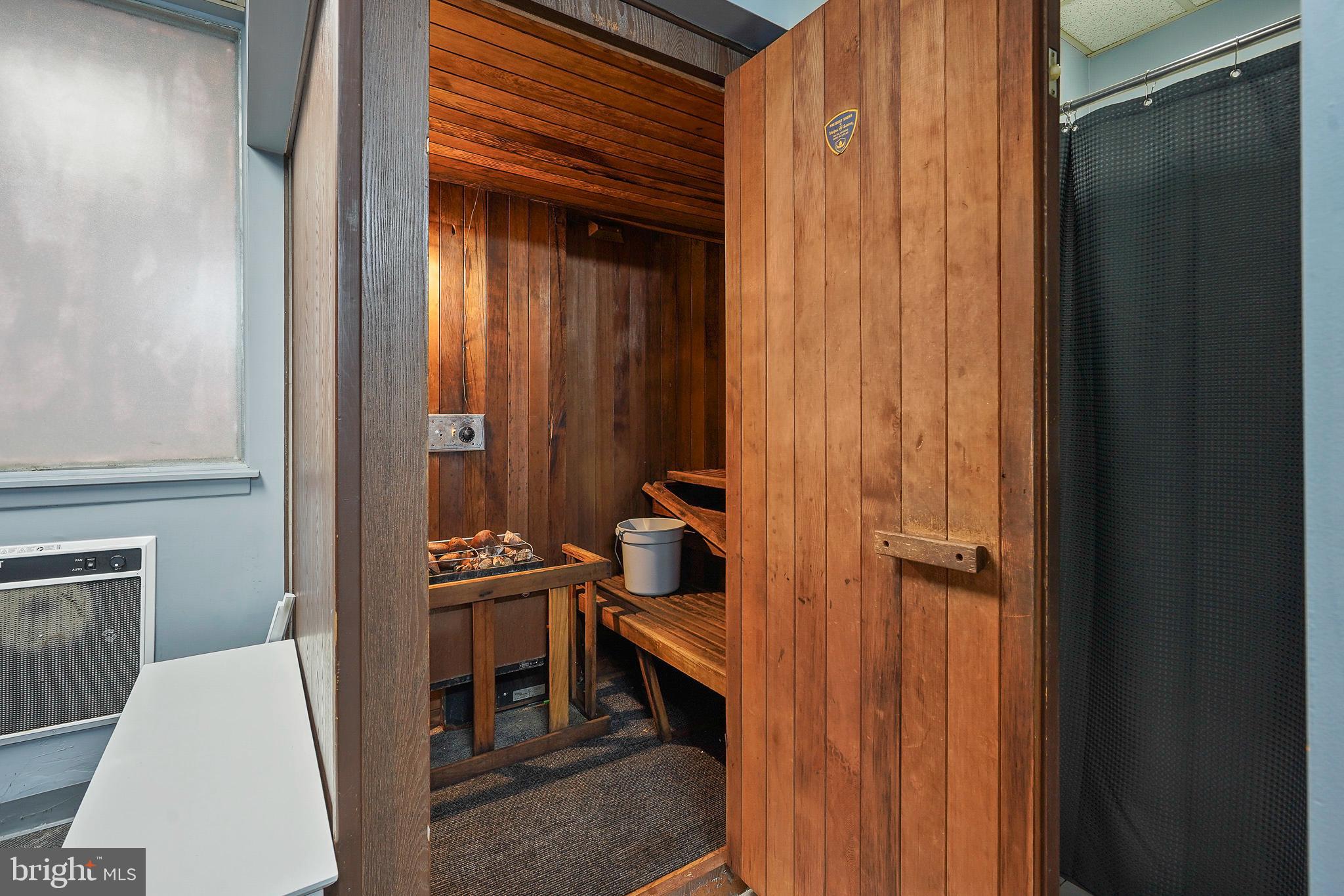 1225 Martha Custis Drive, Unit 1119 Alexandria, VA 22302 - Photo 29 of 36 a bathroom with a sink a toilet and shower