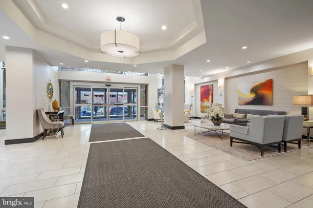 a view of a park with iron fence