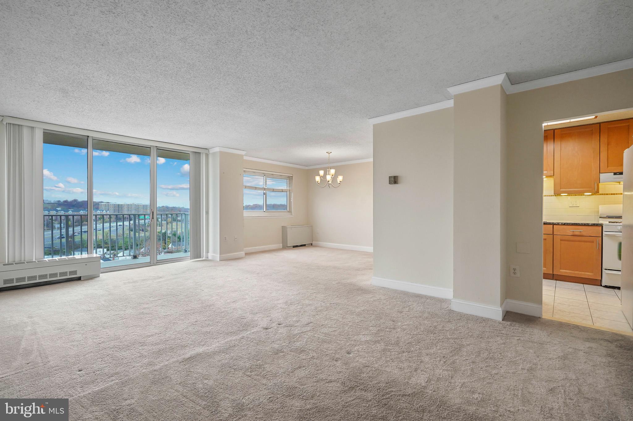 1225 Martha Custis Drive, Unit 1119 Alexandria, VA 22302 - Photo 4 of 36 a view of an empty room with a window