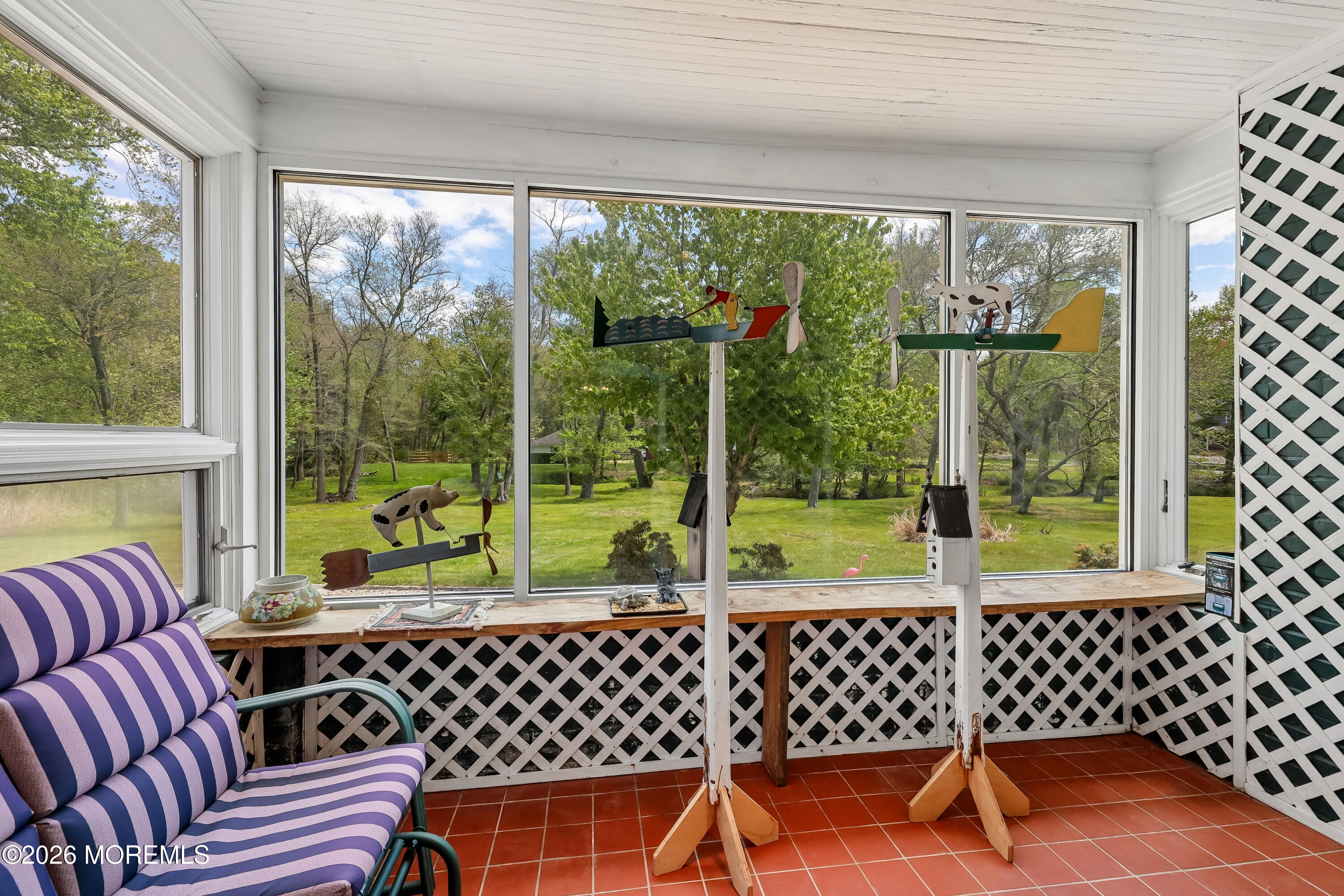 187 Hockhockson Road Colts Neck, NJ 07722 - Photo 25 of 55 a view of a room with furniture large windows
