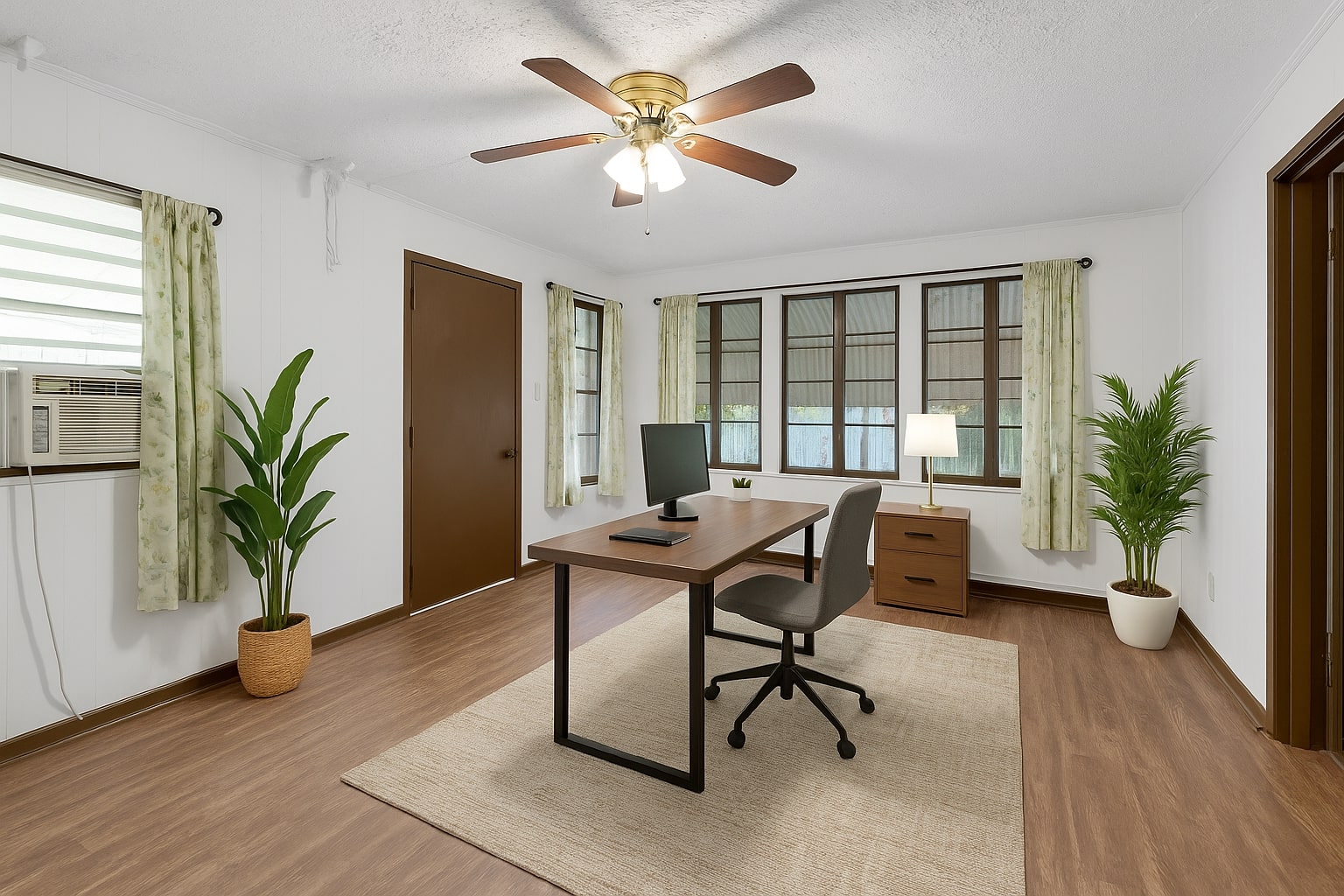 2705 East 2nd Street Austin, TX 78702 - Photo 9 of 36 Office space featuring wood finished floors, cooling unit, ceiling fan, and baseboards. Virtually staged.