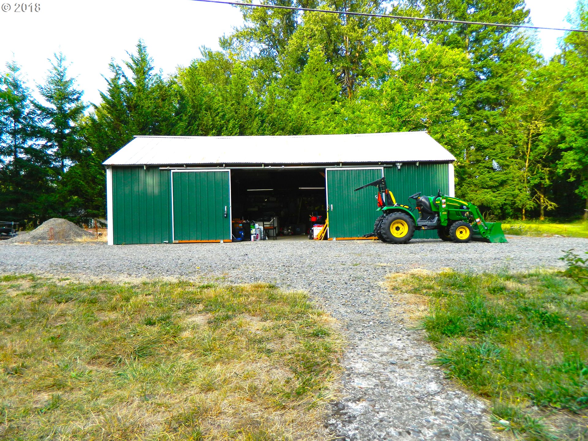 38323 Wheeler Road Dexter, OR 97431 - Photo 9 of 32 a view of a house with basketball court