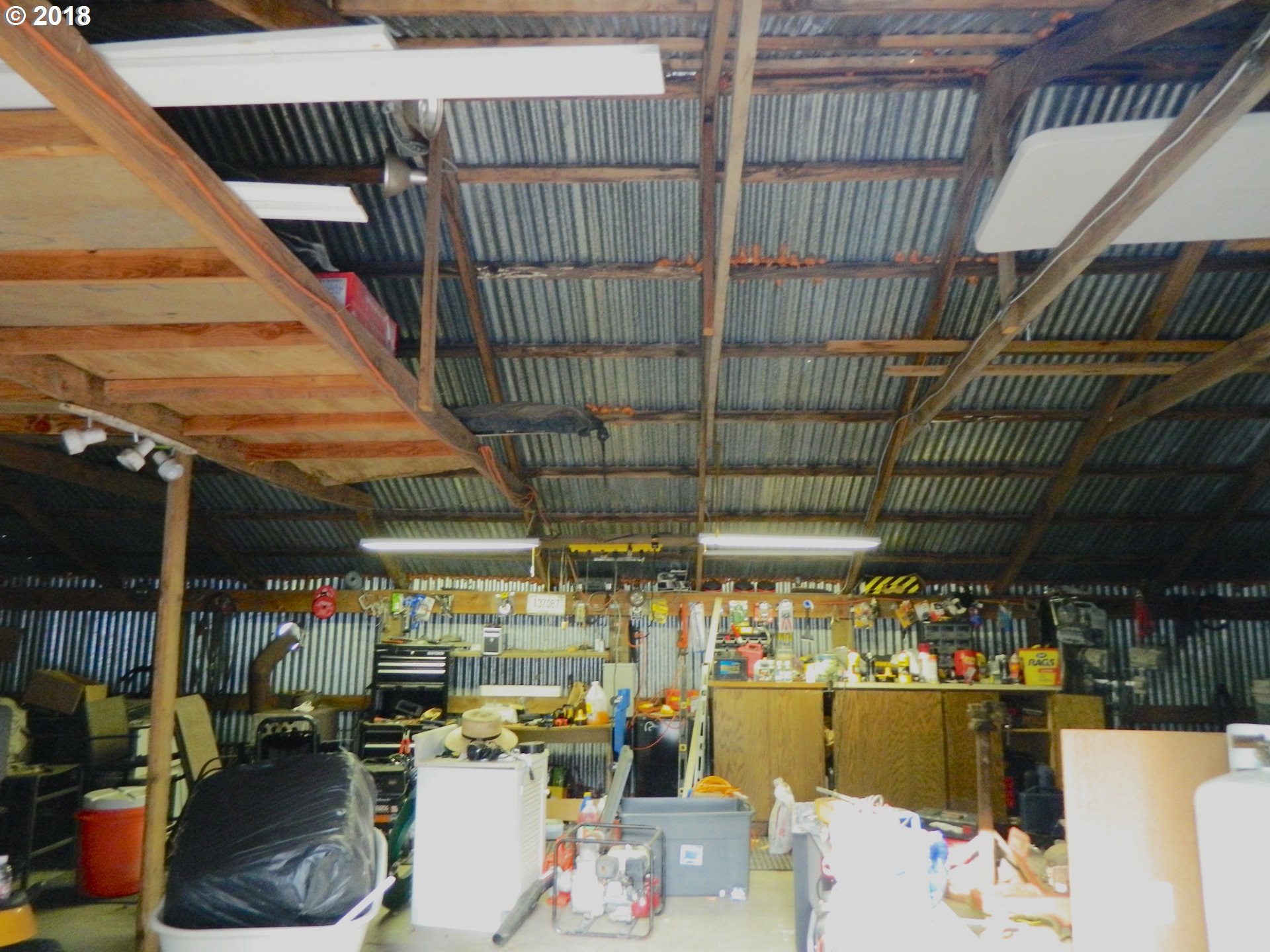 38323 Wheeler Road Dexter, OR 97431 - Photo 10 of 32 a view of store room with washer and dryer