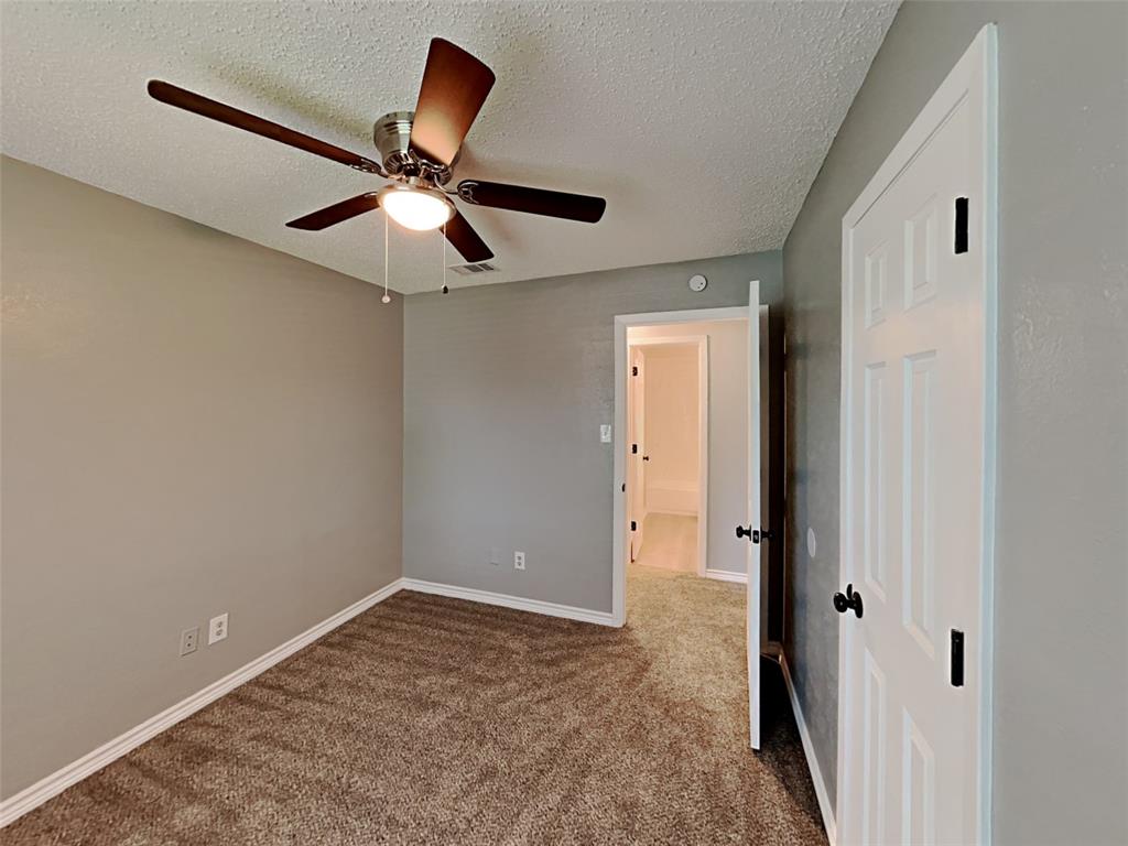 702 Redbud Drive Forney, TX 75126 - Photo 2 of 16 a view of an empty room