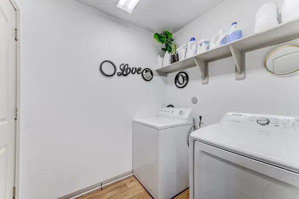 a utility room with dryer and washer
