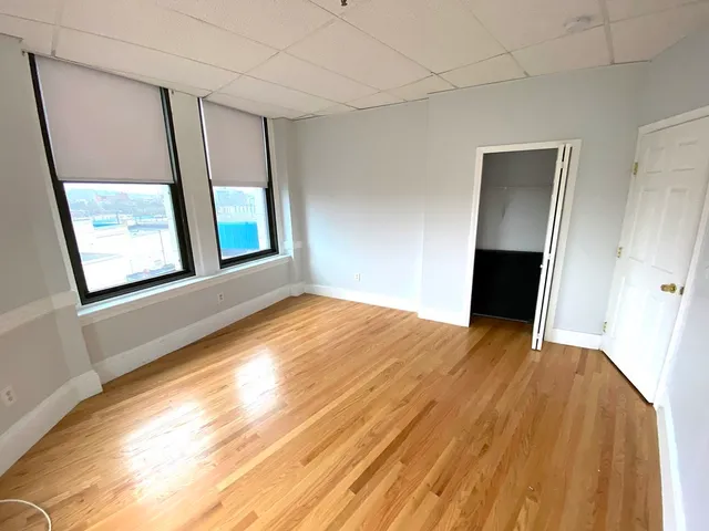 a view of an empty room and window