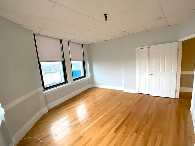 a view of an empty room and window