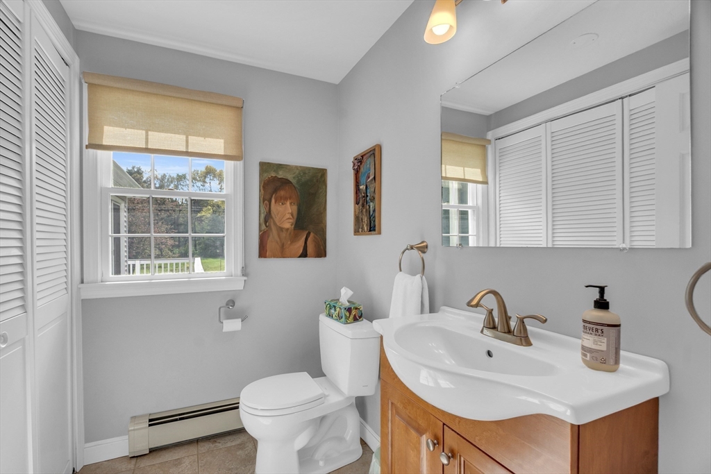 1 Chester Road Boxborough, MA 01719 - Photo 17 of 41 a bathroom with a sink toilet and a mirror