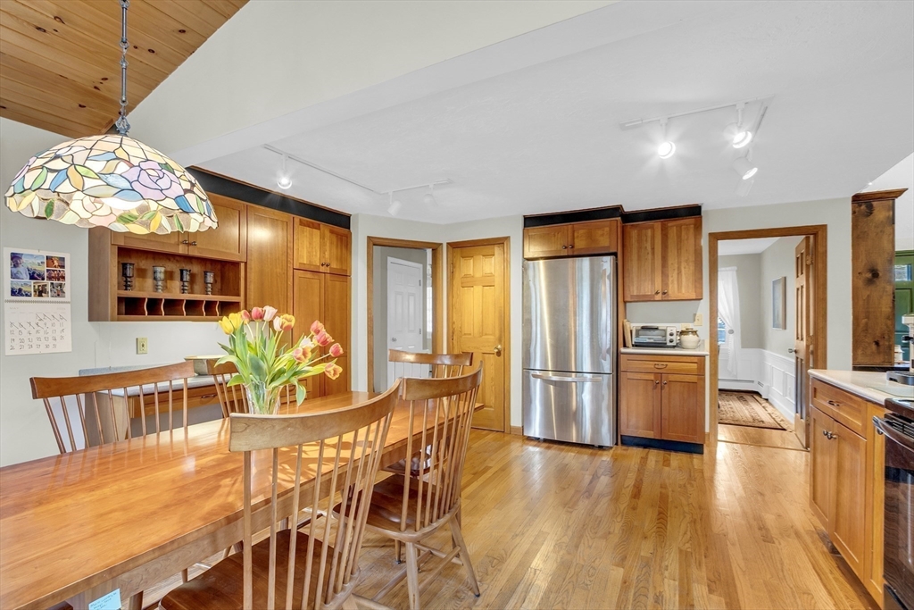 1 Chester Road Boxborough, MA 01719 - Photo 19 of 41 a view of a dining room with furniture window and wooden floor