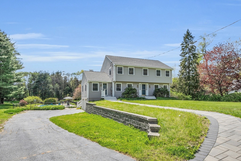 1 Chester Road Boxborough, MA 01719 - Photo 2 of 41 a view of a house with a yard and sitting area